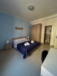 Postel nebo postele na pokoji v ubytování B&B Marco Polo