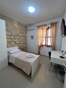 Postel nebo postele na pokoji v ubytování B&B Marco Polo