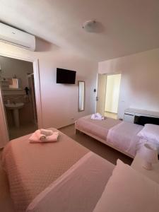Postel nebo postele na pokoji v ubytování B&B Marco Polo