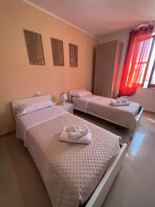 Postel nebo postele na pokoji v ubytování B&B Marco Polo