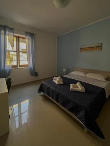 Postel nebo postele na pokoji v ubytování B&B Marco Polo
