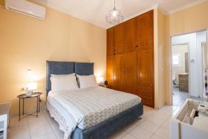 Postel nebo postele na pokoji v ubytování Paradiso Apartments