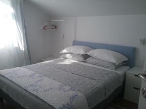 Posteľ alebo postele v izbe v ubytovaní Charlie Apartments