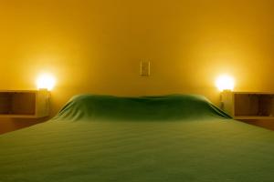 Giường trong phòng chung tại Maipú Departamento J&M - España 29