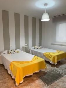 Ένα ή περισσότερα κρεβάτια σε δωμάτιο στο Apartamento Vilagarcia