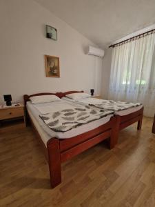Posteľ alebo postele v izbe v ubytovaní Sis&Bro-Novalja