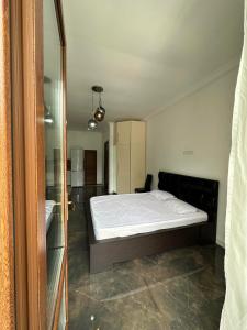 Voodi või voodid majutusasutuse Guest House Nana toas