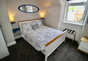 Postel nebo postele na pokoji v ubytování Hunters Guest House