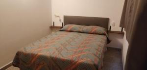 a bedroom with a bed in a room at Apartamento BELA VISTA in Sanxenxo