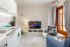 Kuchyň nebo kuchyňský kout v ubytování Aroma Accommodations