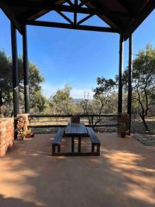 a picnic table sitting on top of a pavilion at Hakuna Matata-Bela Bela in Moheme