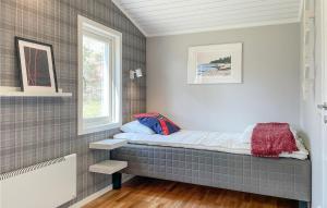 Ένα ή περισσότερα κρεβάτια σε δωμάτιο στο Amazing Home In Rockneby With Wifi