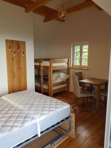 Voodi või voodid majutusasutuse Chalet-Südsteiermark - traumhafte Aussicht, Infinity Pool, Privatsphäre, Klima und de-luxe Ausstattung toas