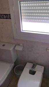 Koupelna v ubytování Duplex en el Centro de Huelva + 11 fotografií