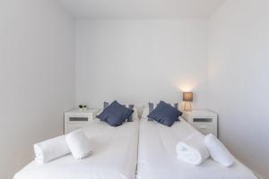 Posteľ alebo postele v izbe v ubytovaní ATICO BRISAS DEL MAR + 23 fotografií