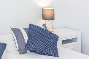 Posteľ alebo postele v izbe v ubytovaní ATICO BRISAS DEL MAR
