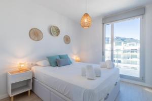 Posteľ alebo postele v izbe v ubytovaní ATICO BRISAS DEL MAR