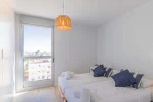 Posteľ alebo postele v izbe v ubytovaní ATICO BRISAS DEL MAR