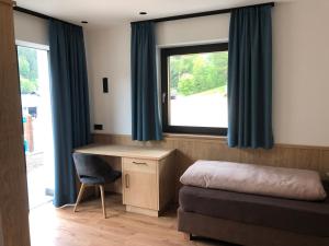 Posedenie v ubytovaní Appartements Pedescin