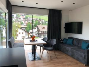 Posedenie v ubytovaní Appartements Pedescin