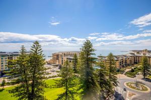 an aerial view of a campus with trees and buildings at Coast on Colley Luxury 1BR Glenelg in Glenelg