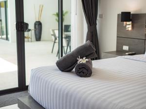 Postel nebo postele na pokoji v ubytování Villa Yana 2 bedrooms Lamai