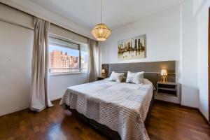 Postel nebo postele na pokoji v ubytování Entre Ríos 73 - B Centro + 19 fotografií