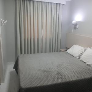 Кровать или кровати в номере Paulista Flat