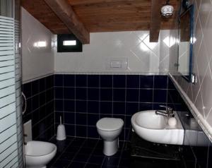 Ванная комната в Feudo di Plutino