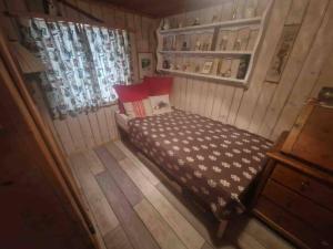 Postel nebo postele na pokoji v ubytování Ferienhaus in Graubünden