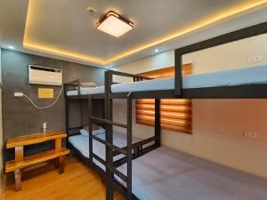 Postel nebo postele na pokoji v ubytování Juan Divers - Anilao, Mabini, Batangas