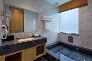 Vannituba majutusasutuses Guangdong Hot Spring Hotel