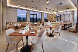 Restoran või mõni muu söögikoht majutusasutuses Guangdong Hot Spring Hotel