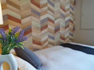 Postel nebo postele na pokoji v ubytování Hotel New Gaea Itoshima