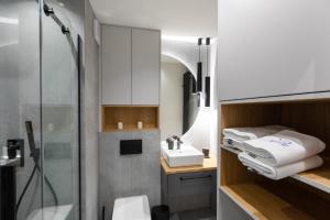 Koupelna v ubytování Apartament Orchidea by Major Domus Club