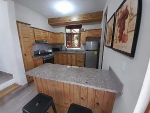 Küche/Küchenzeile in der Unterkunft Villa encantadora Pino alto Jarabacoa