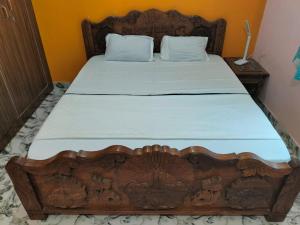 Lagnalaya- Your Next Home客房内的一张或多张床位