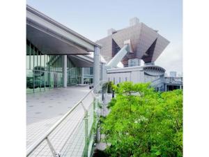 an external view of a building with trees in front at Urayasu Sun Hotel - Vacation STAY 33007v in Urayasu