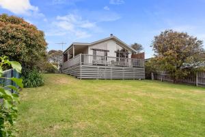 a house with a large yard in front of it at 38 Bayview Drive in Cowes