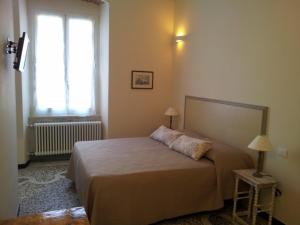 A bed or beds in a room at La Casa al Mare