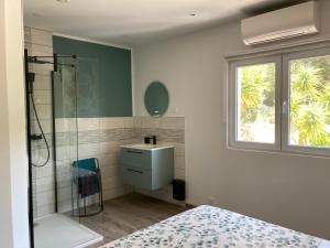 a bathroom with a shower and a sink at Chez Jean Claude la villa des amis in Olmeto +86 photos