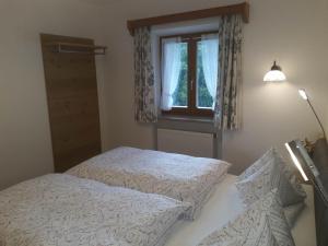 Postel nebo postele na pokoji v ubytování Haus Widlbrandlehen