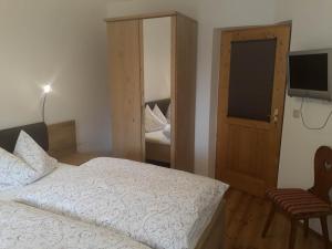 Postel nebo postele na pokoji v ubytování Haus Widlbrandlehen