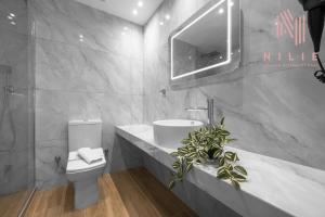 Kúpeľňa v ubytovaní Ultima, Nilie Hospitality MGMT + 37 fotografií