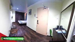 Voodi või voodid majutusasutuse Hotel Sunjoy9 Klang toas