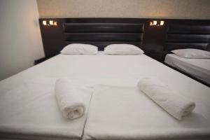 Postel nebo postele na pokoji v ubytování Hotel Irise