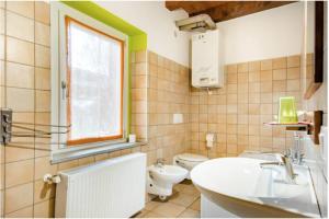 Vannituba majutusasutuses B&B Ai Tigli