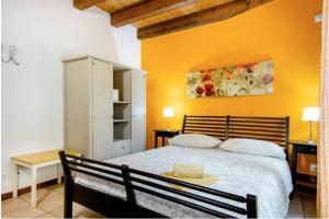 Voodi või voodid majutusasutuse B&B Ai Tigli toas