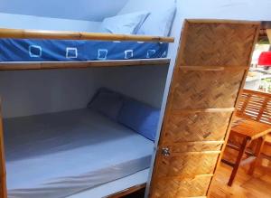 Postel nebo postele na pokoji v ubytování Las Colmena Kubotel/Lodge