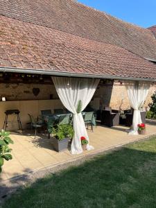 Vonkajšia záhrada v ubytovaní Gîte La maison de Jules